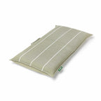 Cushioned green portable and durable seat shown folded flat for outdoor lounging