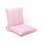 Angled view of a compact pink outdoor chair for the beach or park